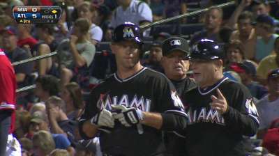Hill makes first start behind the plate