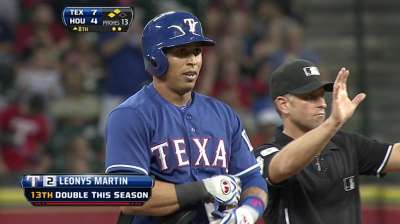 Rangers ride four-run eighth to win vs. Astros