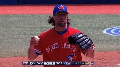 Oliver yields three to A's in decisive eighth