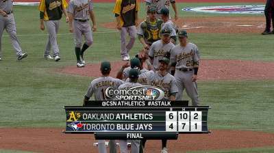 A's prevail after ninth-inning scare