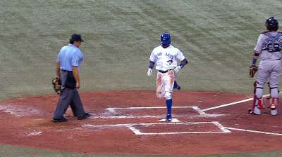 On grounder back to mound, Davis races around bases