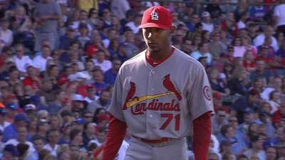 Cards recall lefty Freeman to beef up bullpen