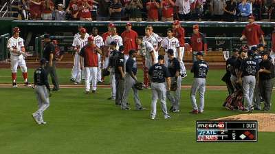 Stras ejected after throwing behind Simmons twice
