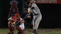 Stubbs settles marathon with two-run shot in 14th