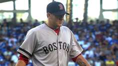 Peavy's three-hitter puts Red Sox alone in first