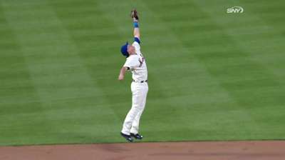 Flores makes debut at second base