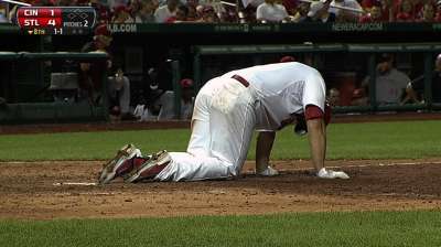 Cardinals' win no picnic for beat-up Holliday
