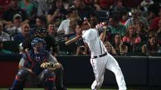 Late homers shrink Braves' magic number to 10