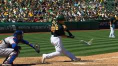 A's beat Darvish again, rejoin Rangers atop AL West