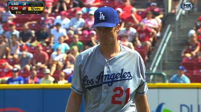 Dodgers fall on walk-off single in extras