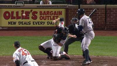 Wild night: Yanks sink O's late, keep pace
