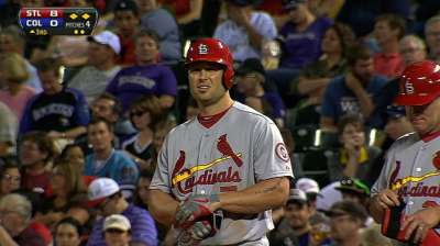 Holliday's big night lifts Cardinals into first place