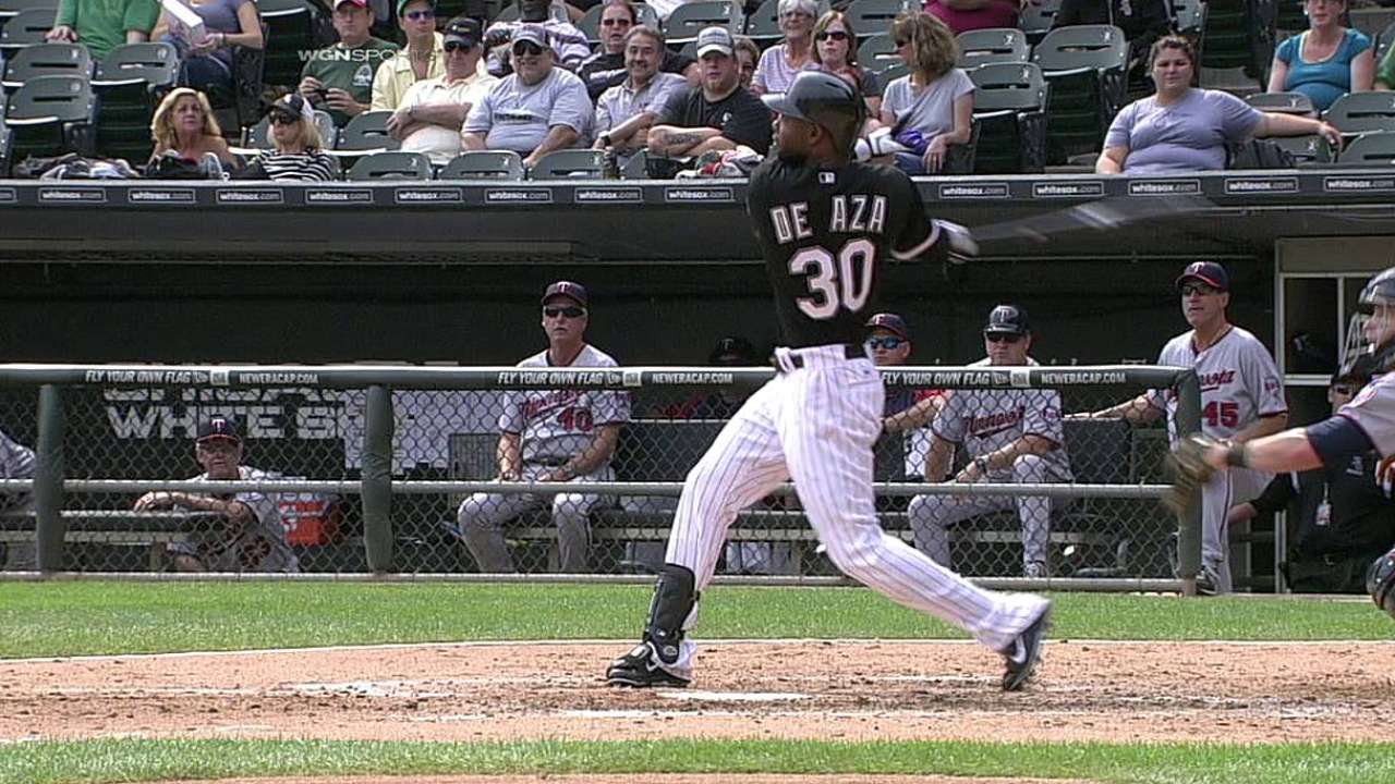 White Sox avoid arbitration with Beckham, De Aza