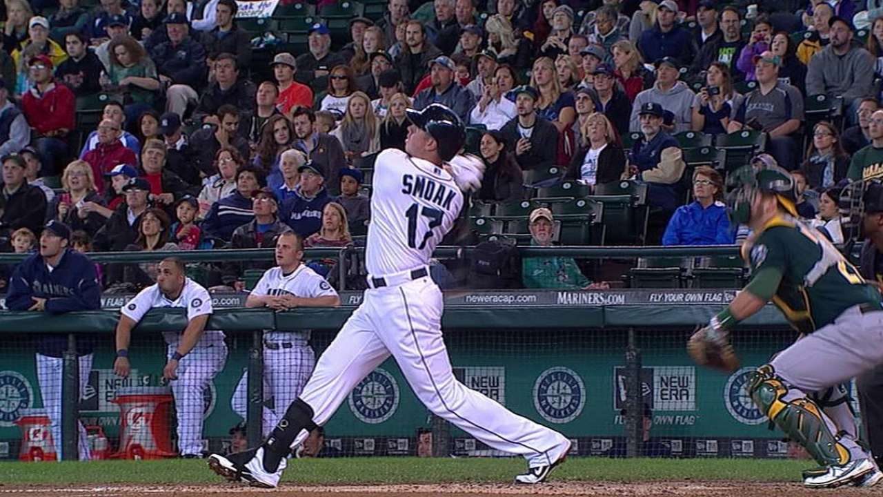 Smoak, Morrison exchange figures with Mariners