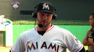 Hill proud to be behind plate for Alvarez