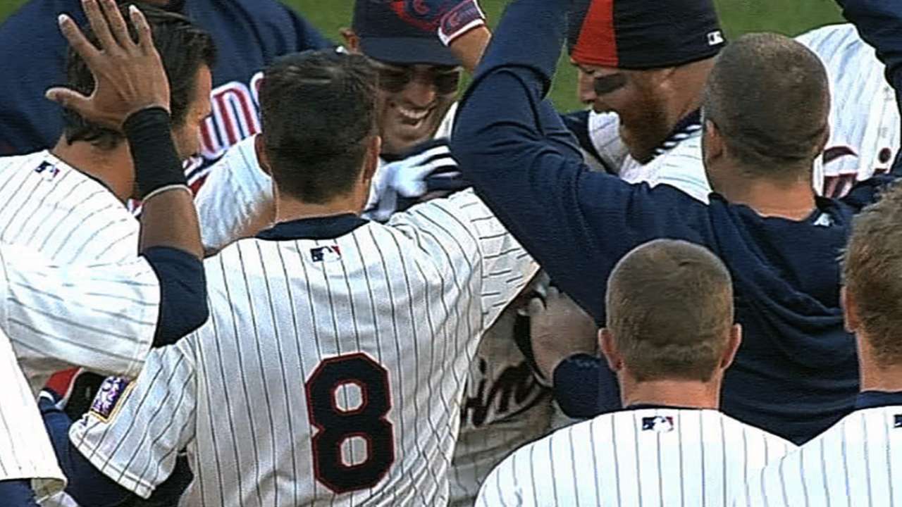 Escobar comes up big as Twins walk off