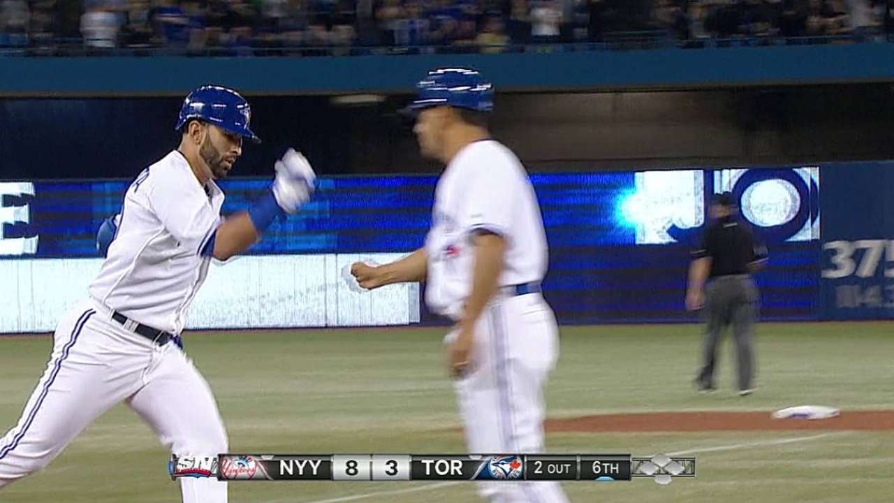 Bautista returns to Blue Jays' lineup, homers