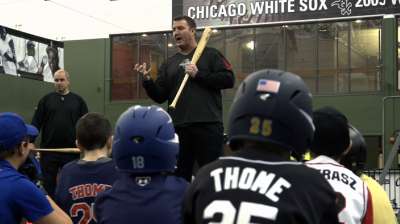 Thome lends insight to kids at hitting clinic