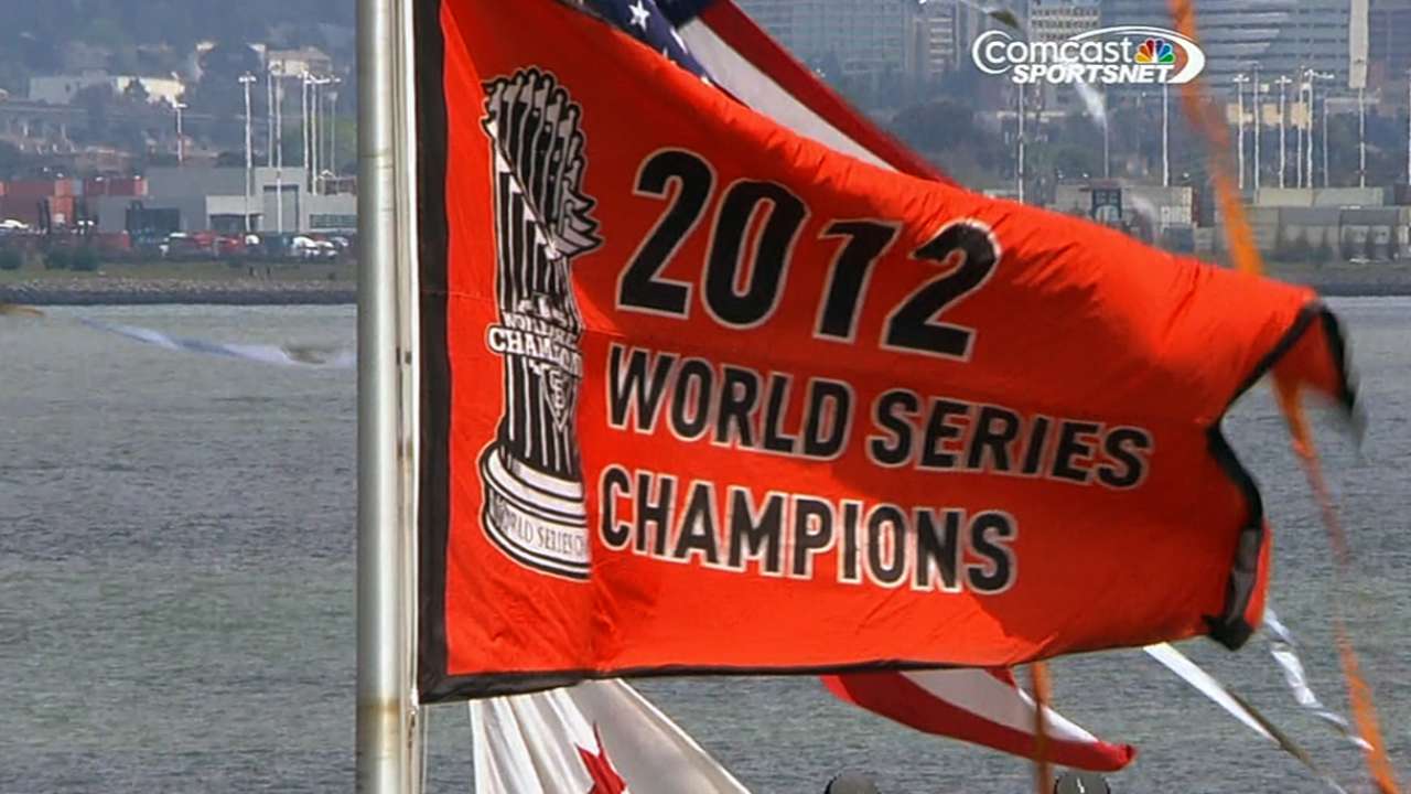 Giants salute team effort in flag-raising ceremony