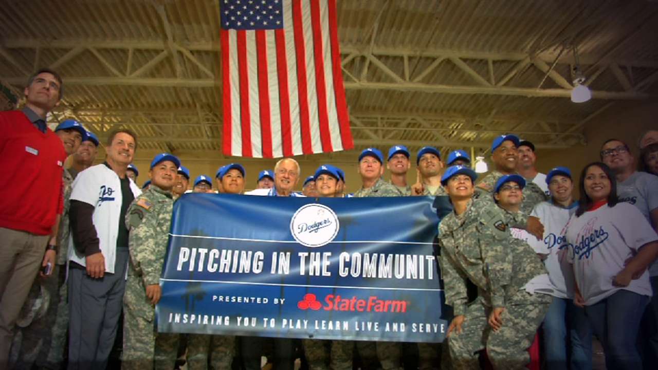 Dodgers players help community to end caravan