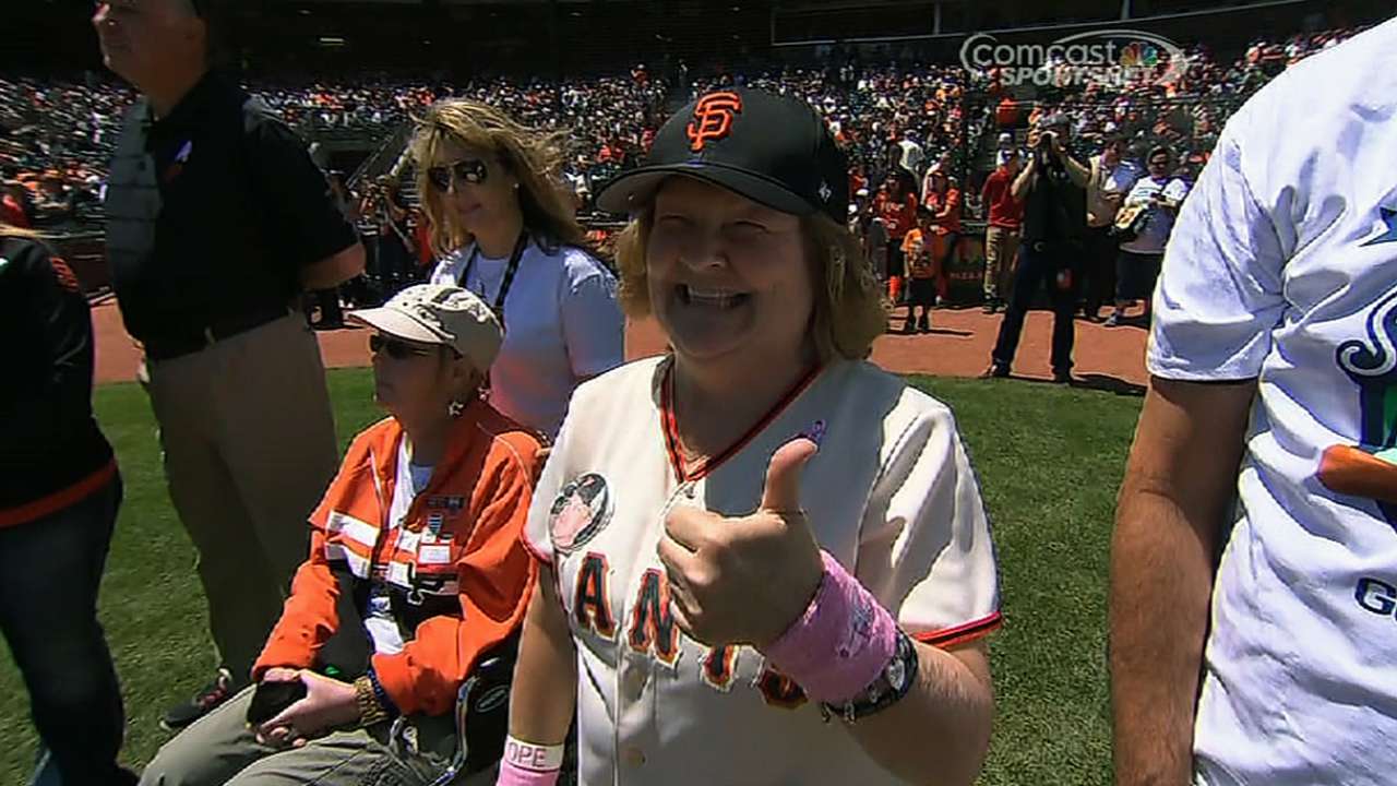 Cancer survivor shares story as Giants' bat girl