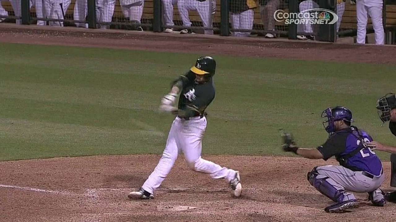 A's ride big fourth inning, win first challenge