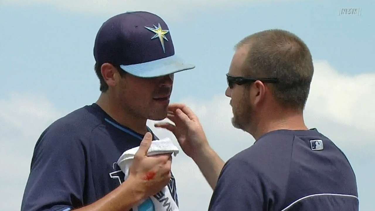 Moore avoids scare on comebacker to mouth