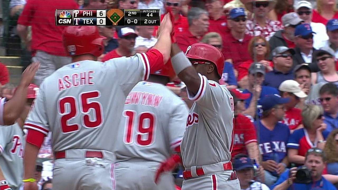 Rollins hits HR No. 200 in 14th straight opener start