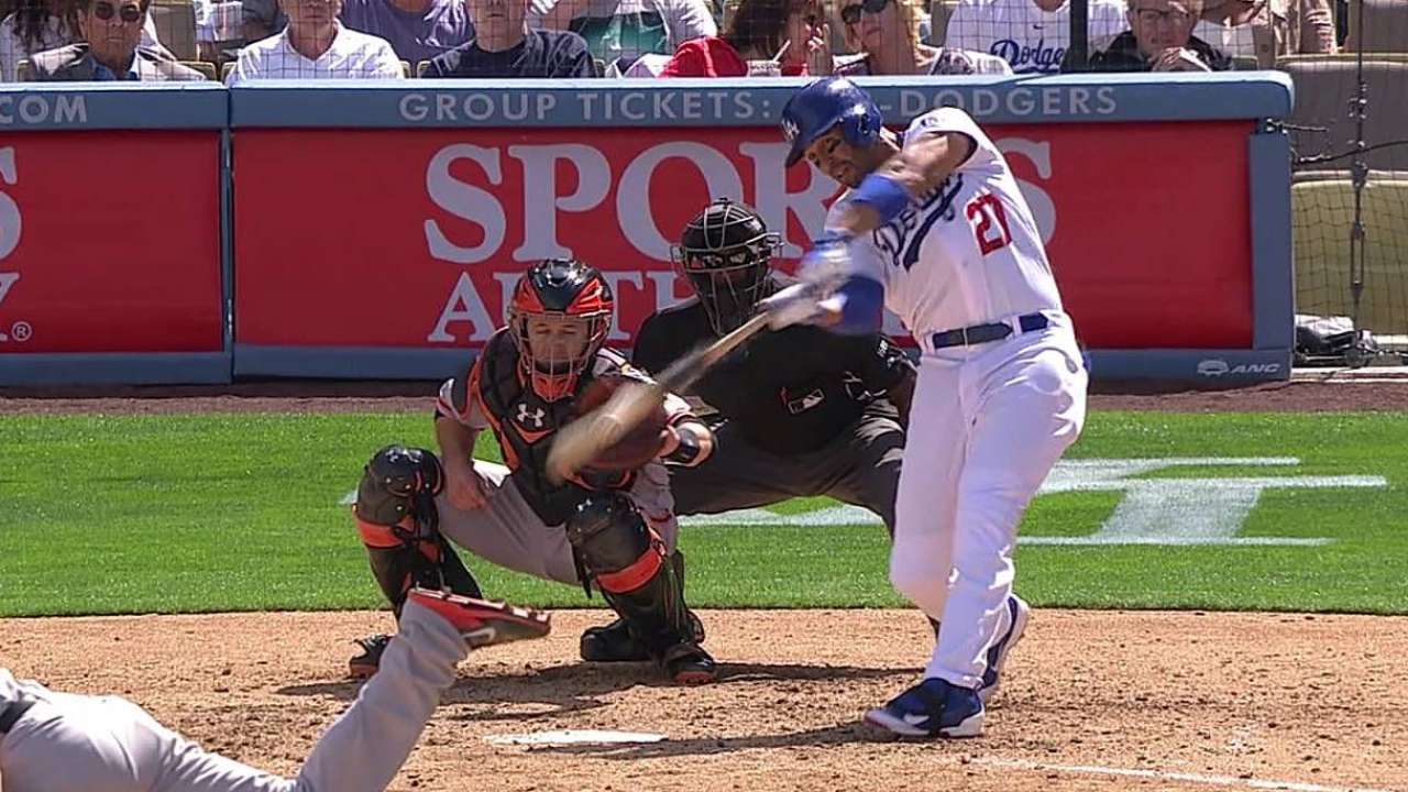 Kemp makes debut, but Puig still steals show