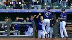 Blackmon belts two of five Rox homers in rout