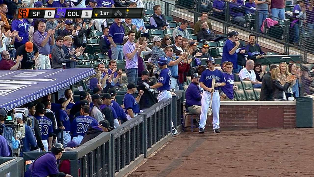 Blackmon belts two of five Rox homers in rout