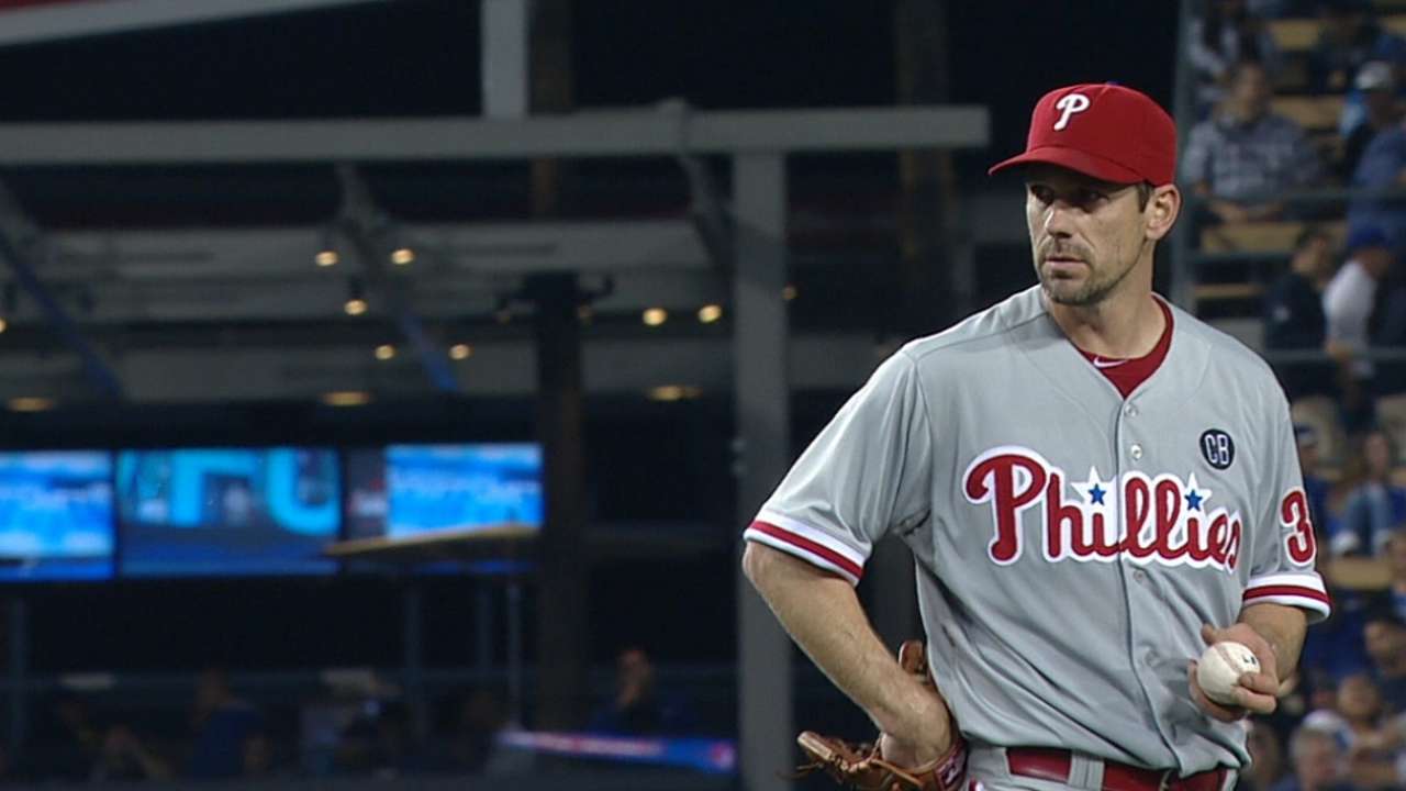 Lee retires 20 straight Dodgers in four-hit gem