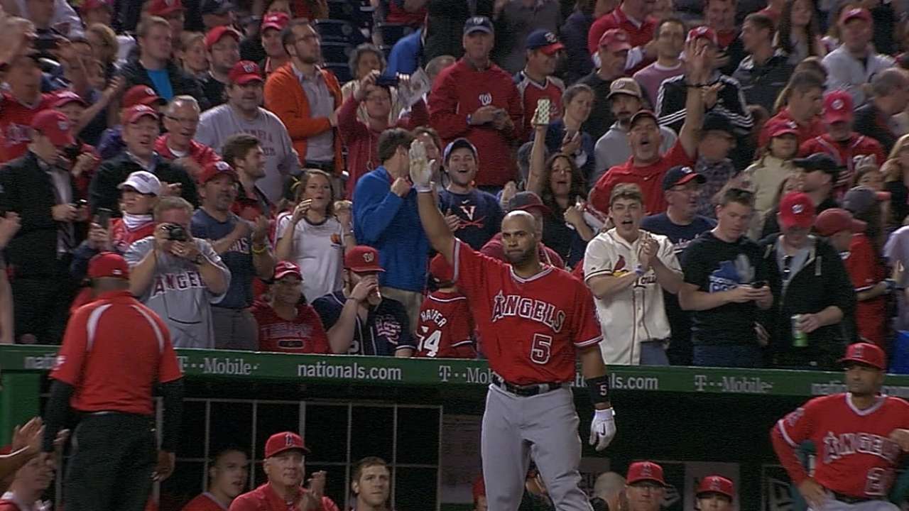 Pujols' milestone homer brings smiles to Cardinals