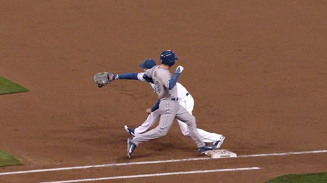 KC's challenge overturns Blue Jays' hit, RBI