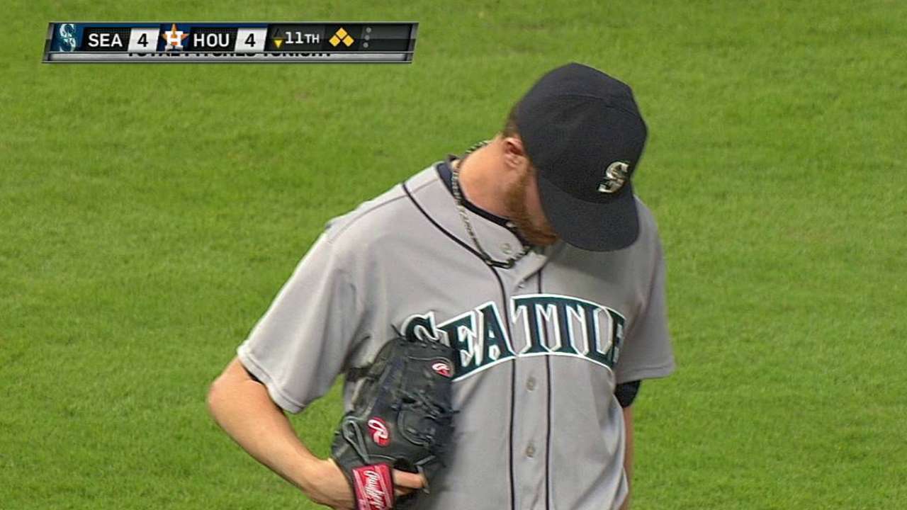 Mariners stung by Astros rookie in 11th inning