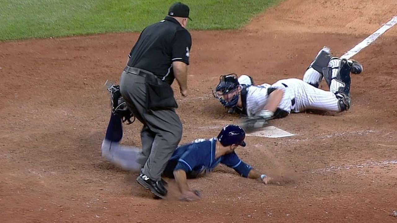 Pair of safe calls at first overturned in Rays-Yanks tilt