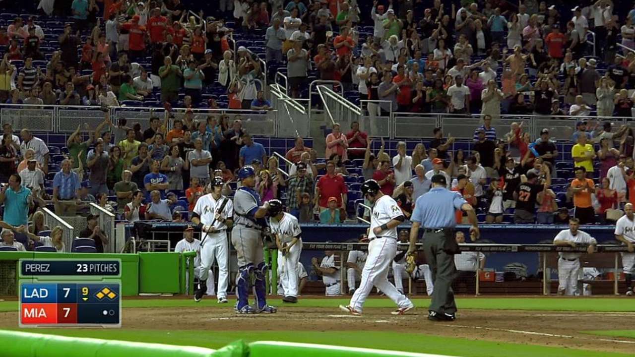 Marlins fall in extra innings after big rally