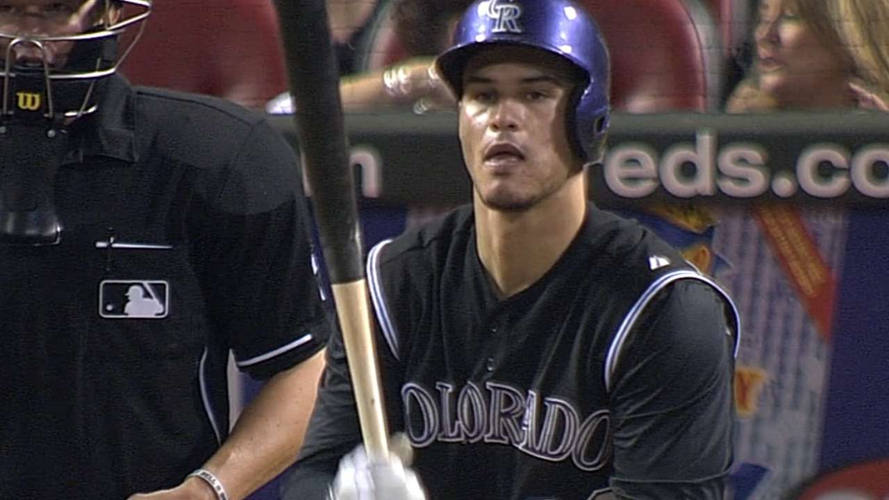 Arenado takes walk in ninth to end hit streak