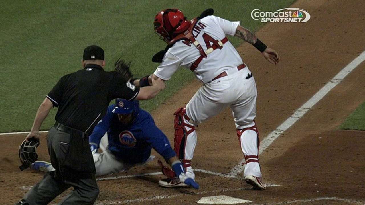 Cubs win challenge on play at plate, awarded run
