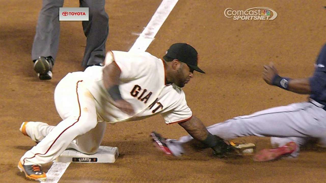 B. Upton out at third after Giants win challenge