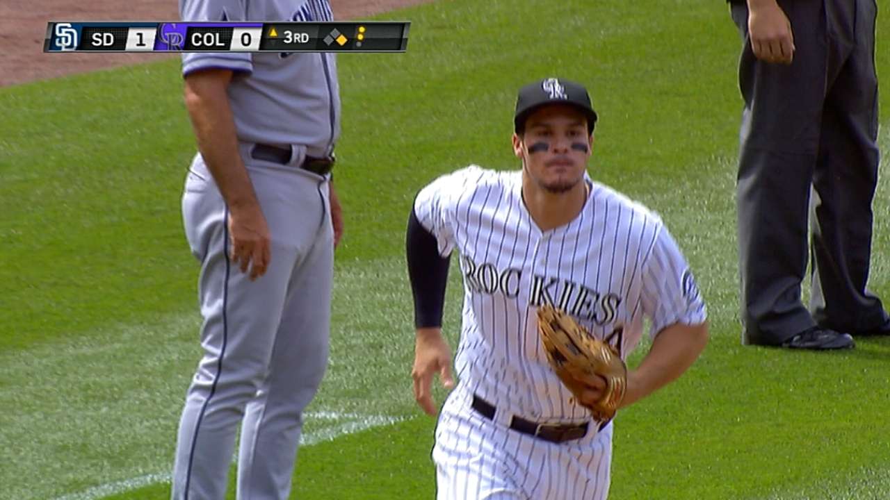 Interference call helps Rockies turn three