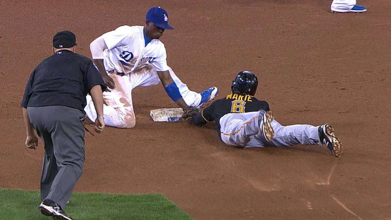Dodgers' successful challenge can't hold off Bucs' rally