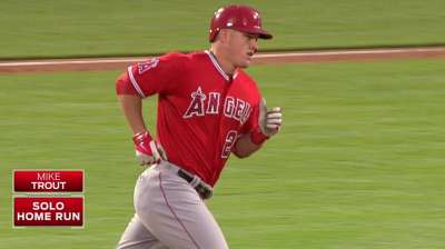Trout exits series opener with mid-back discomfort