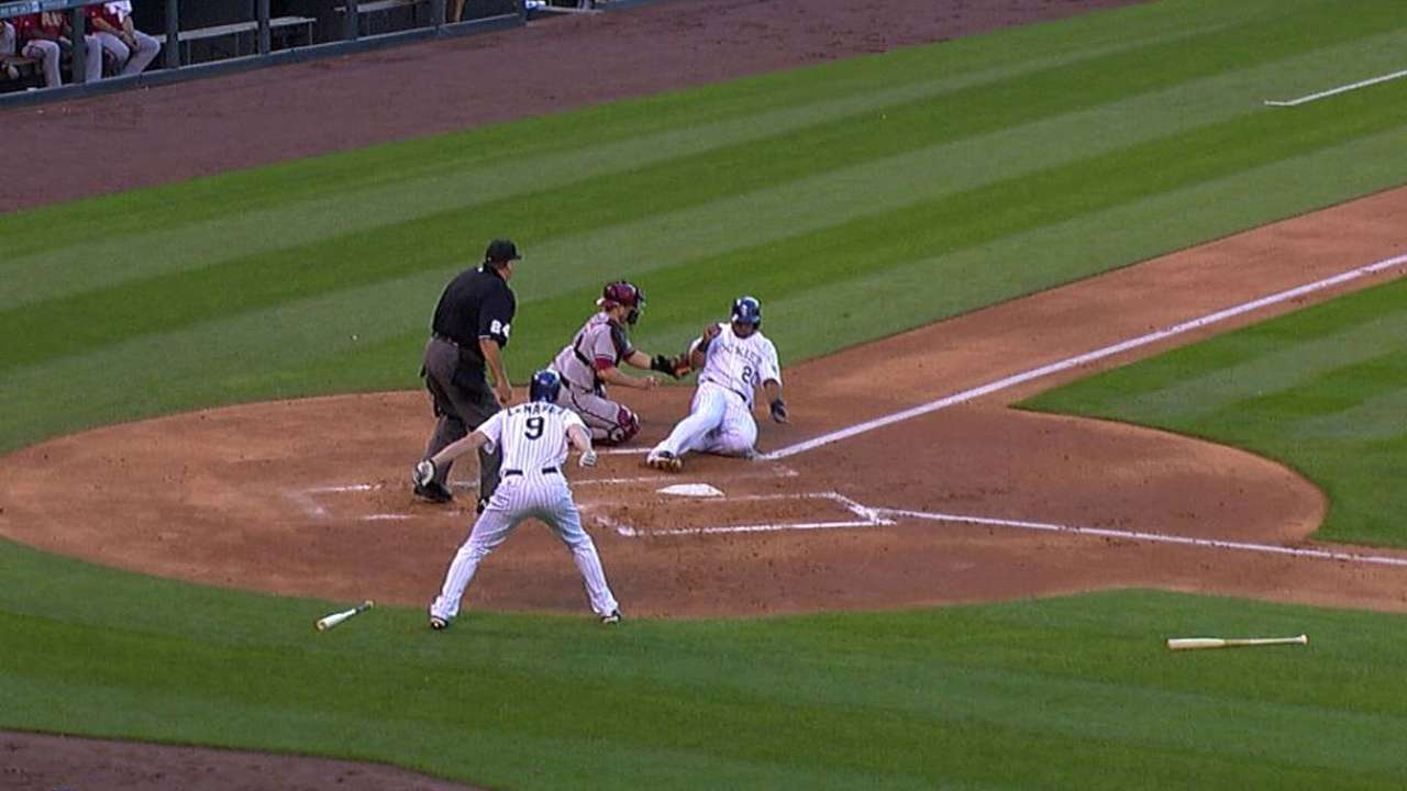 Rockies' run erased in second as D-backs win challenge