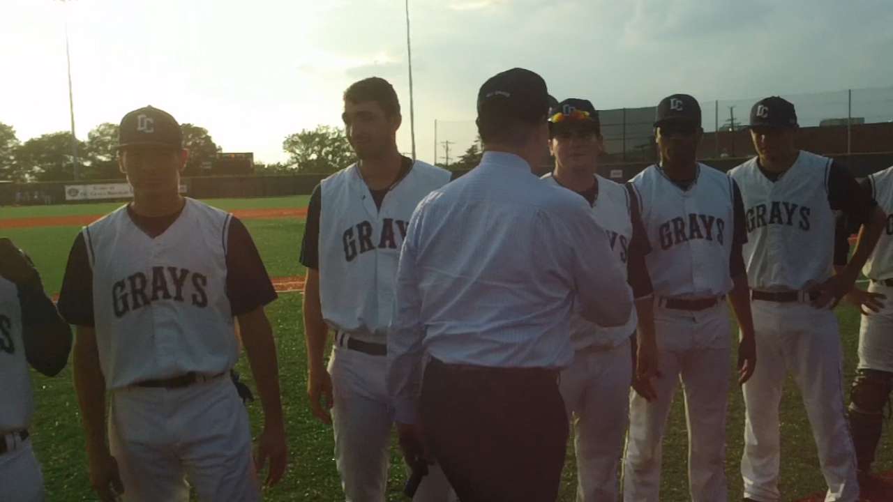 Washington mayor tosses first pitch for Grays game