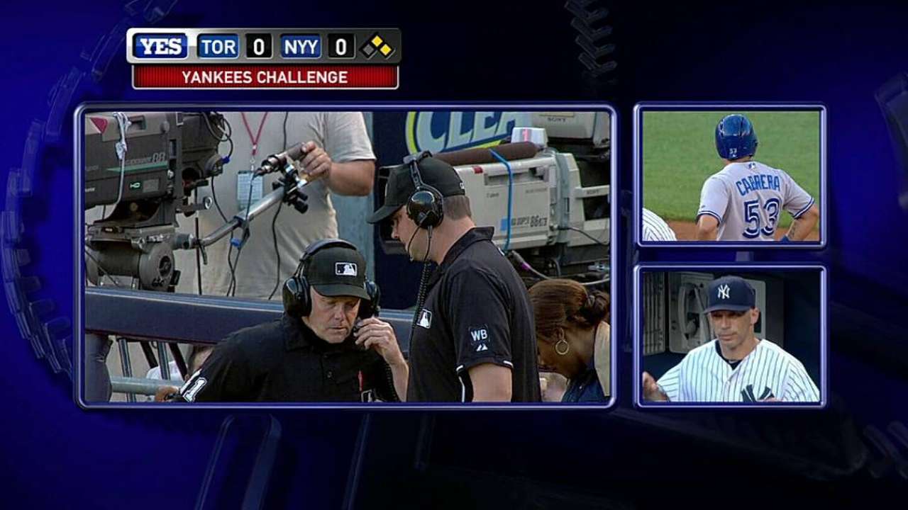 Yanks gain on two reviews against Blue Jays