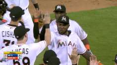 Ozuna's arm denies Mets, saves it for Alvarez