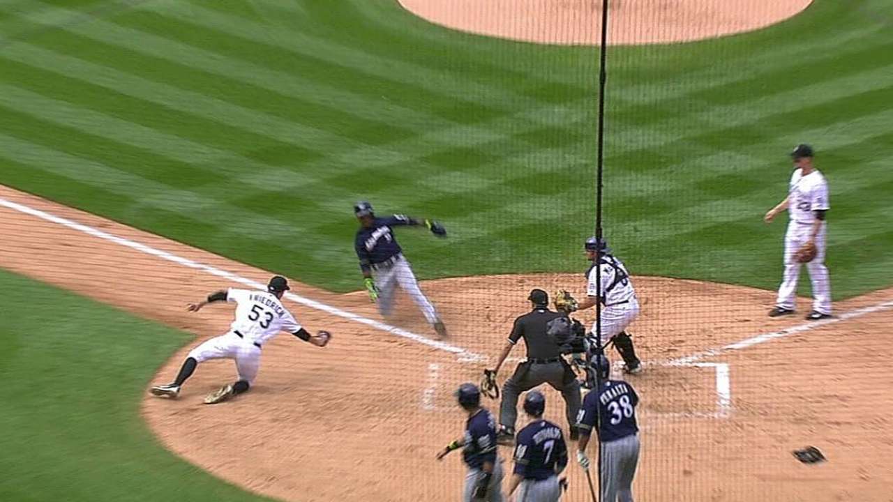 Wild pitch becomes a wild play at Coors Field