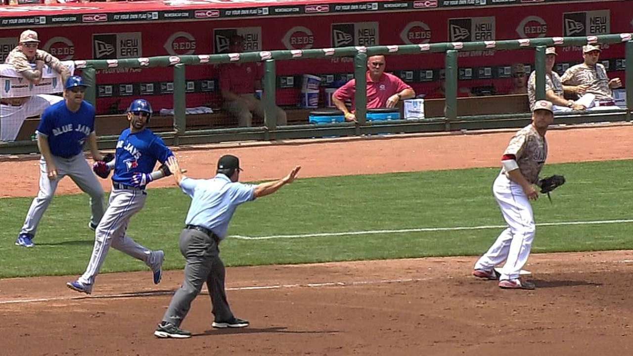 Two close plays at first base favor Blue Jays