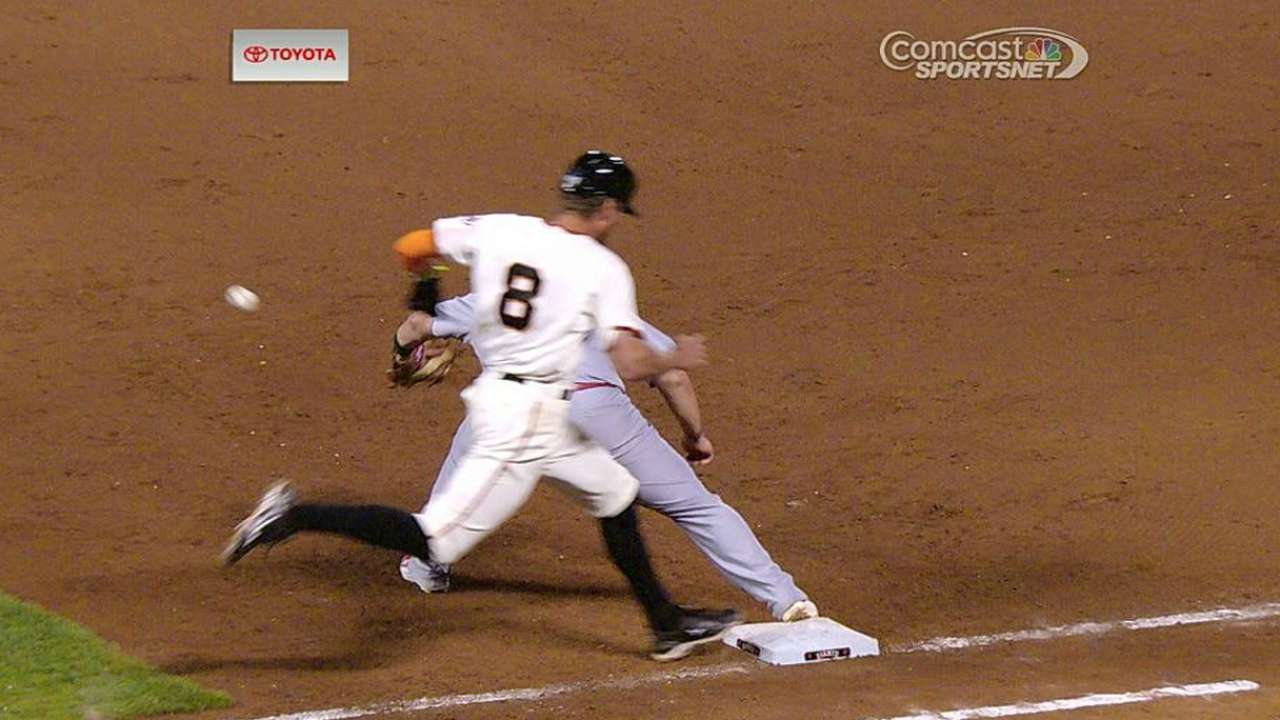 Giants win challenge in ninth on play at first